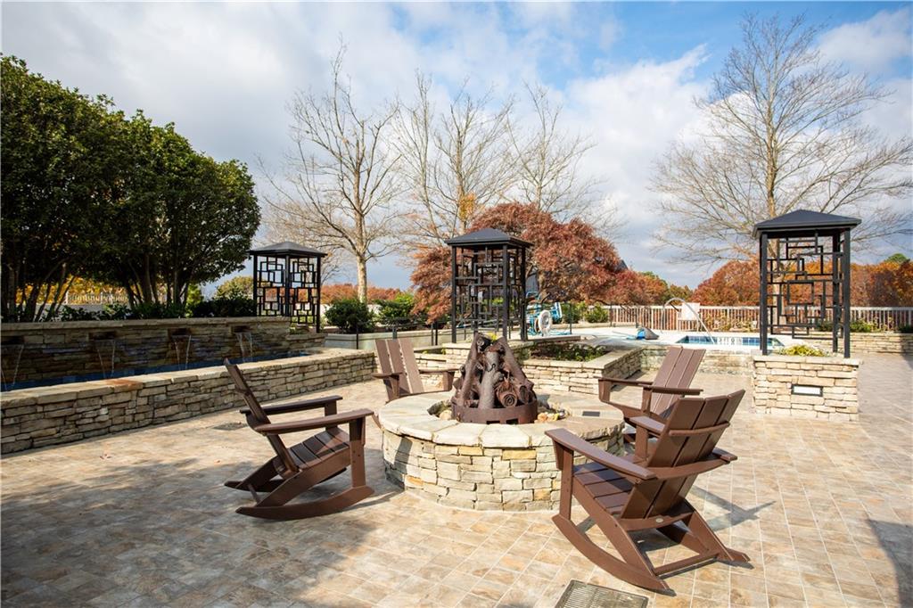 3300 Windy Ridge Parkway Southeast, Unit 713 Atlanta, GA 30339 - Photo 23 of 35 a view of outdoor space with seating