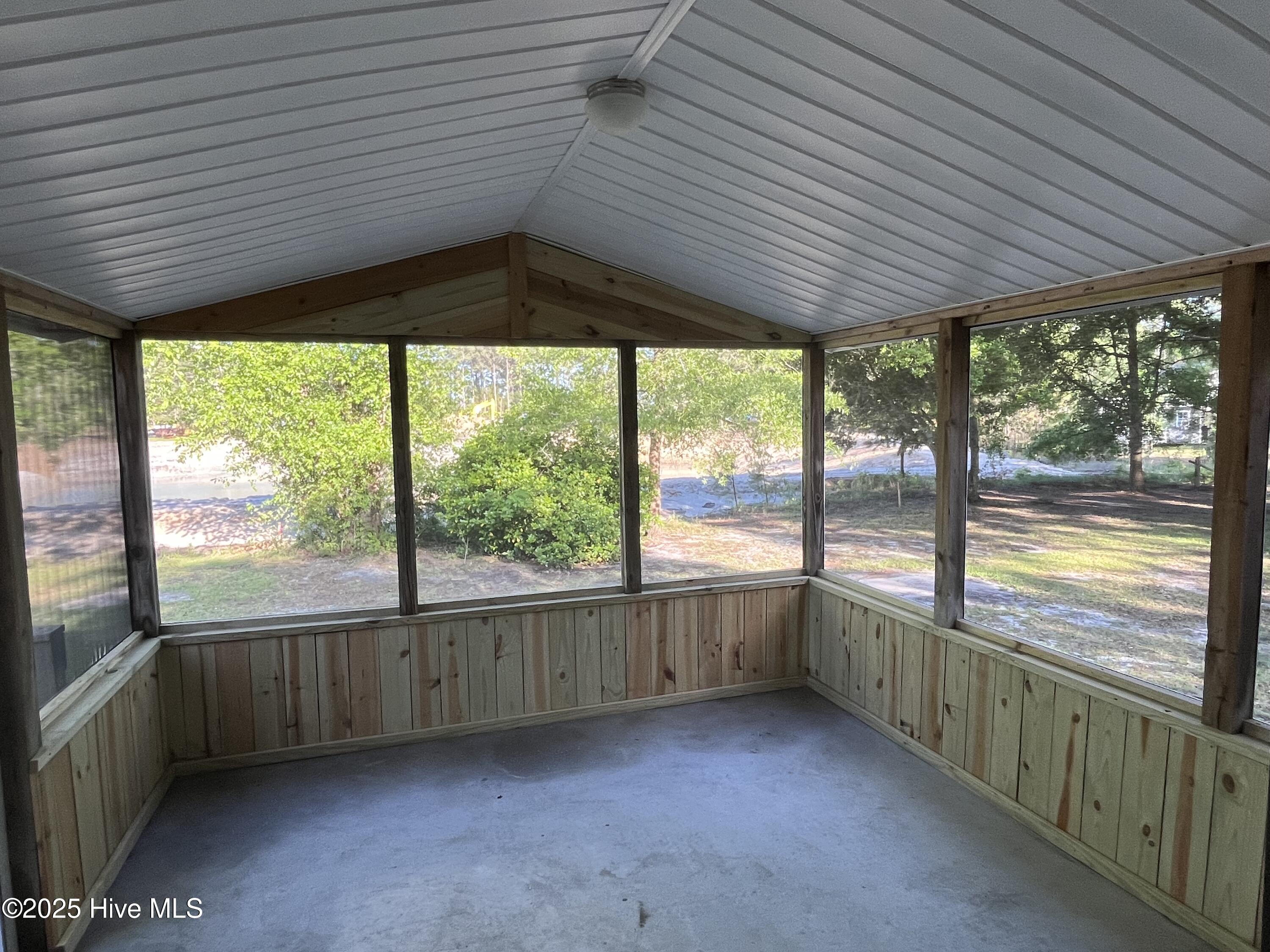 202 Susans Drive Hampstead, NC 28443 - Photo 18 of 18 Screened Porch