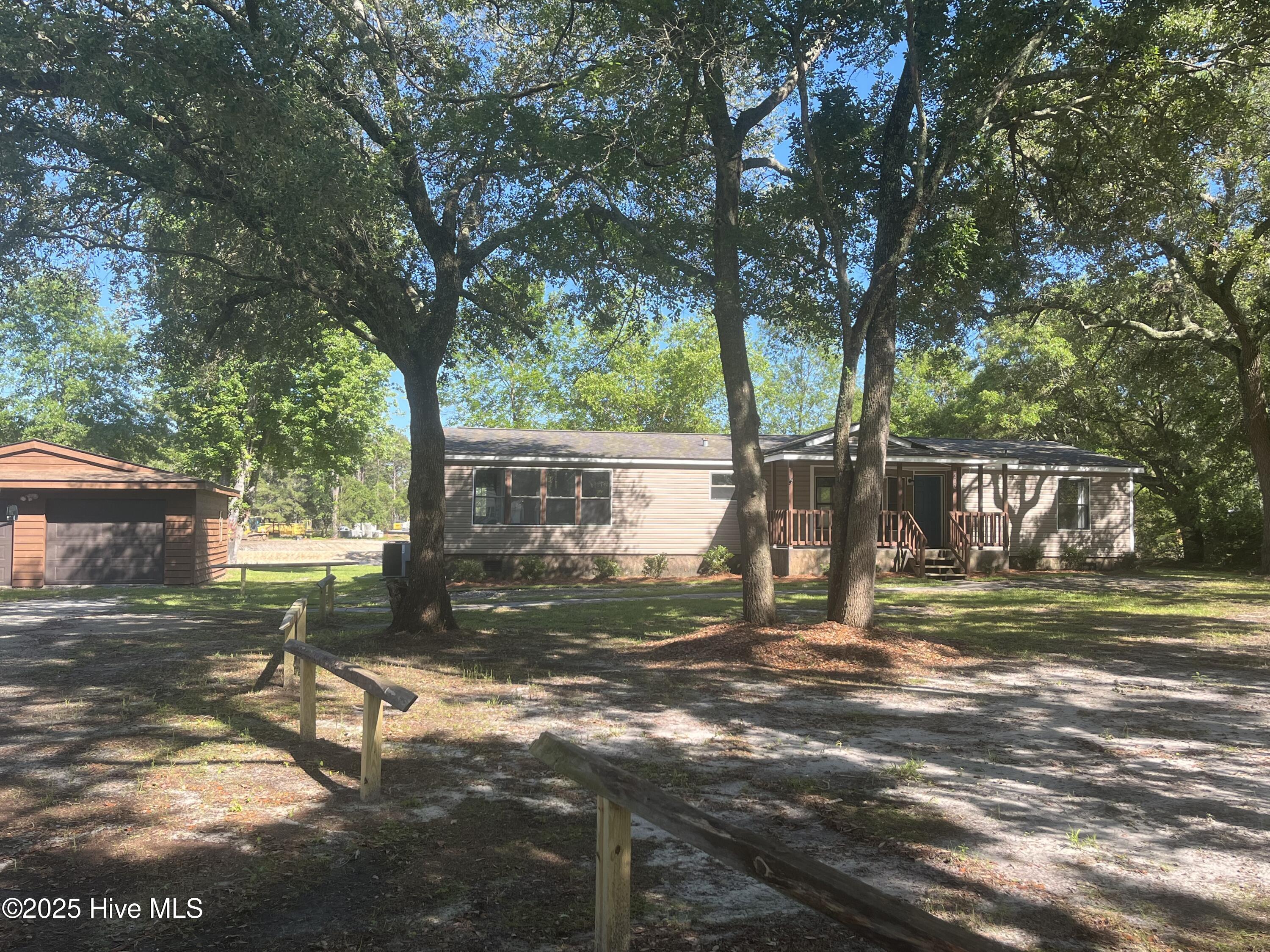 202 Susans Drive Hampstead, NC 28443 - Photo 2 of 18 Front View with Garage