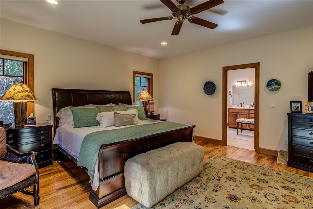 119 Blackberry Lane Boone, NC 28607 - Photo 16 of 41 a bed room with a bed and a chair