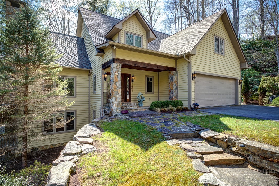 119 Blackberry Lane Boone, NC 28607 - Photo 2 of 41 a front view of a house with garden