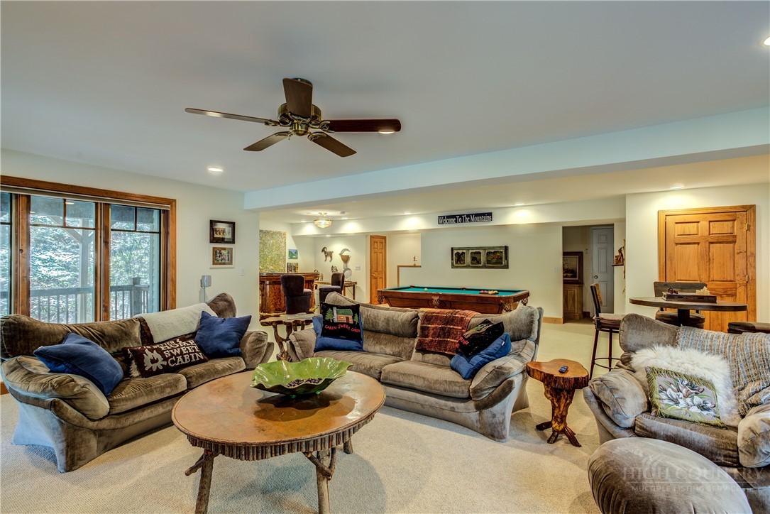 119 Blackberry Lane Boone, NC 28607 - Photo 21 of 41 a living room with furniture and a large window