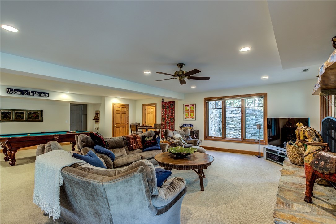 119 Blackberry Lane Boone, NC 28607 - Photo 22 of 41 a living room with furniture and floor to ceiling window