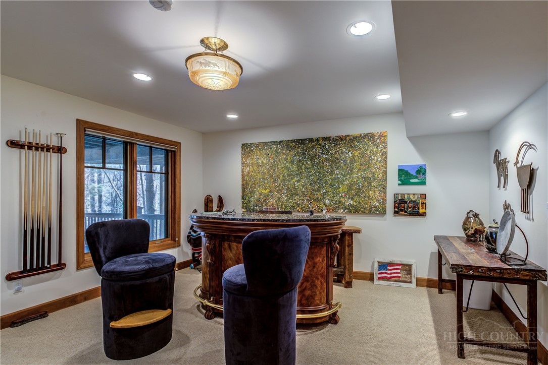119 Blackberry Lane Boone, NC 28607 - Photo 25 of 41 a living room with furniture and a large window