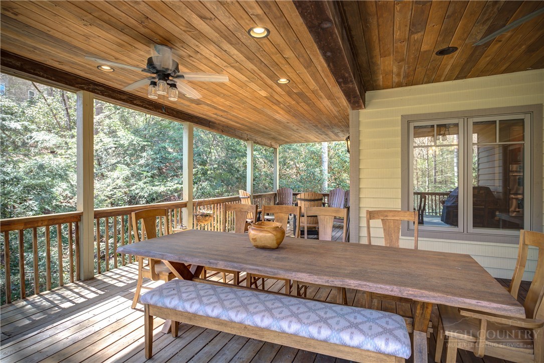 119 Blackberry Lane Boone, NC 28607 - Photo 40 of 41 a view of a dining room with furniture wooden floor and chandelier
