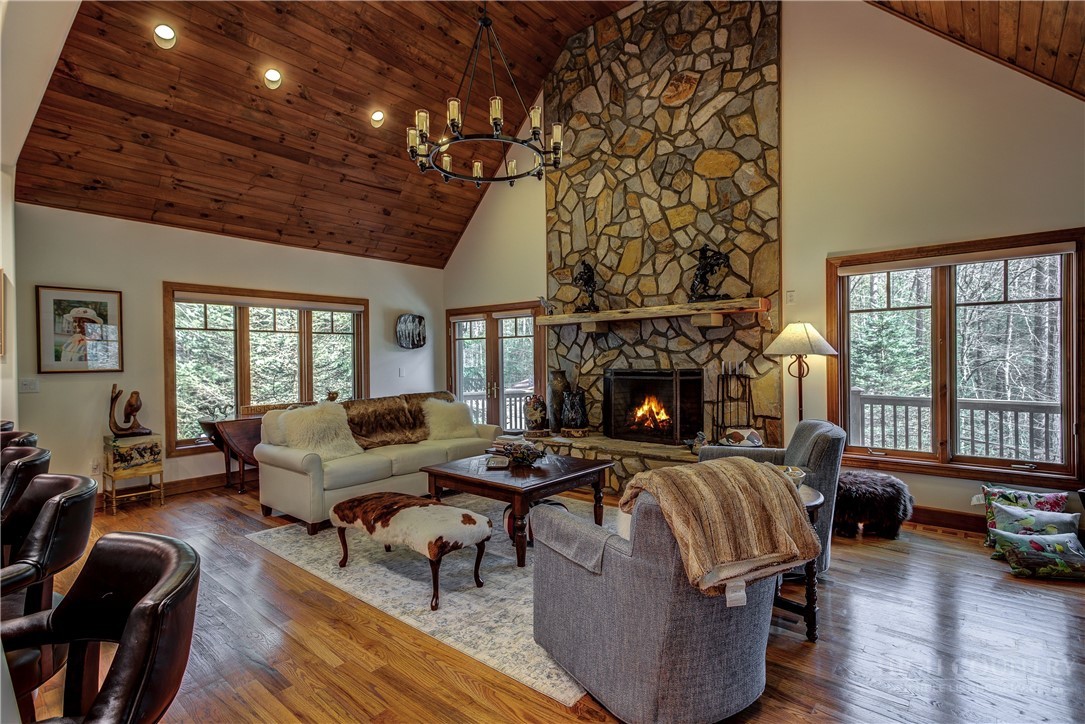 119 Blackberry Lane Boone, NC 28607 - Photo 5 of 41 a living room with furniture and a fireplace