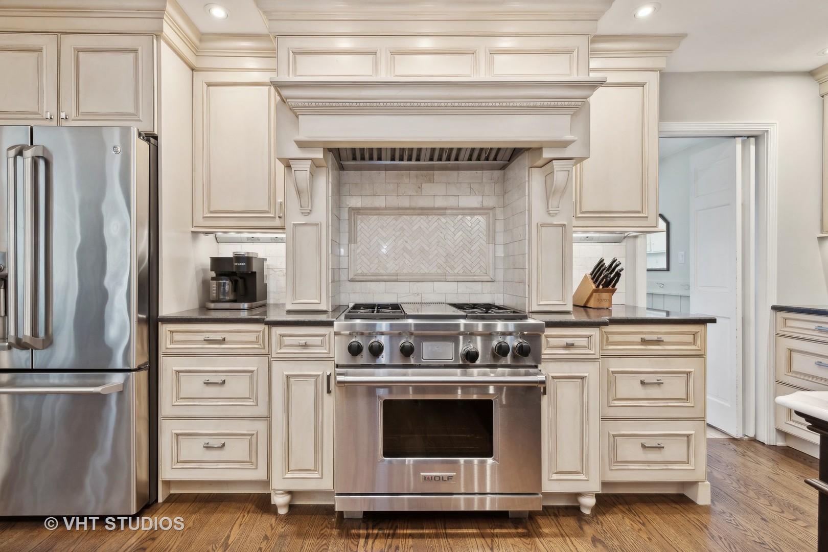 255 Cold Spring Road Barrington, IL 60010 - Photo 12 of 47 a kitchen with stainless steel appliances a stove and a refrigerator