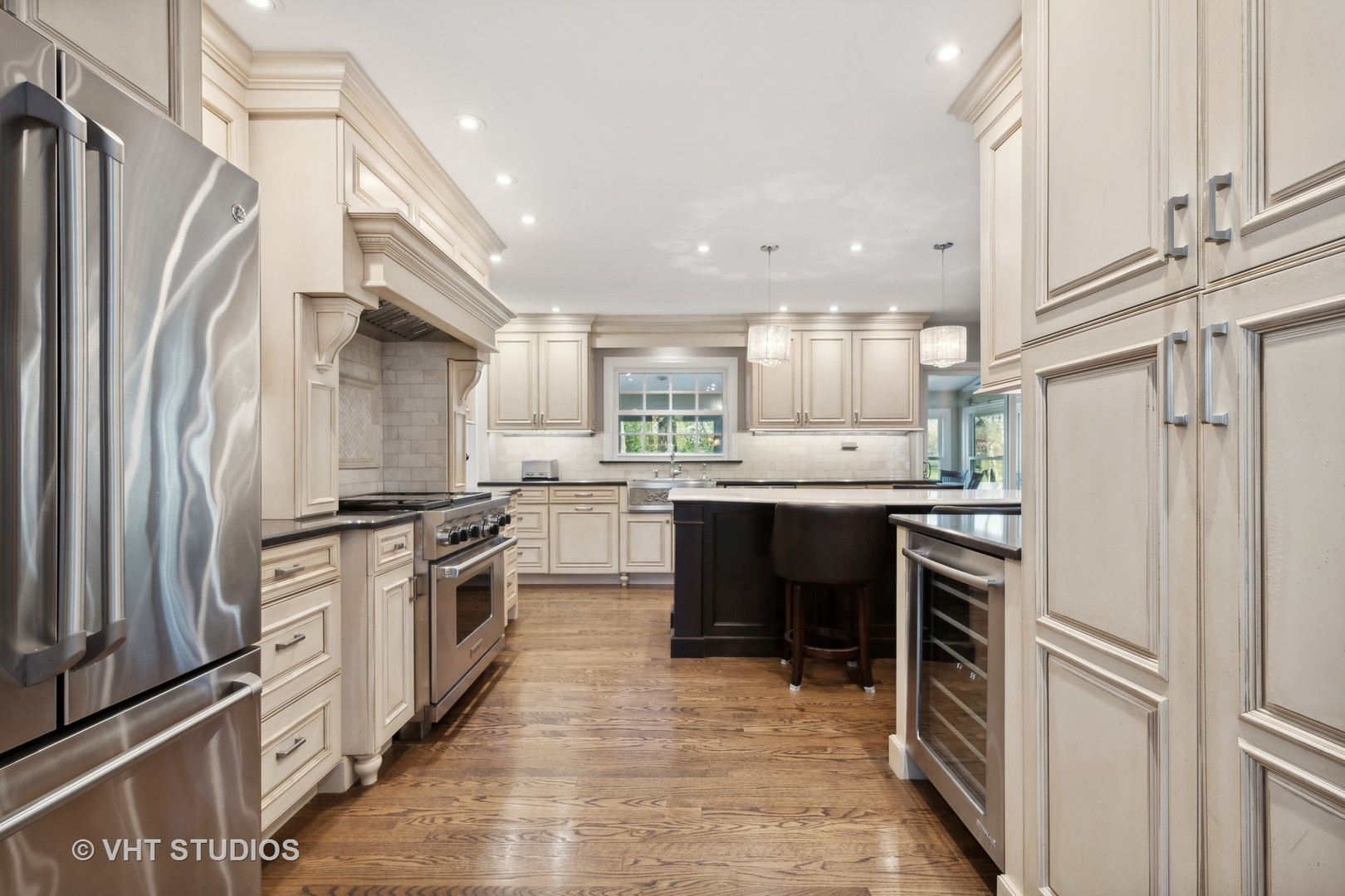 255 Cold Spring Road Barrington, IL 60010 - Photo 13 of 47 a kitchen with a sink stainless steel appliances and cabinets