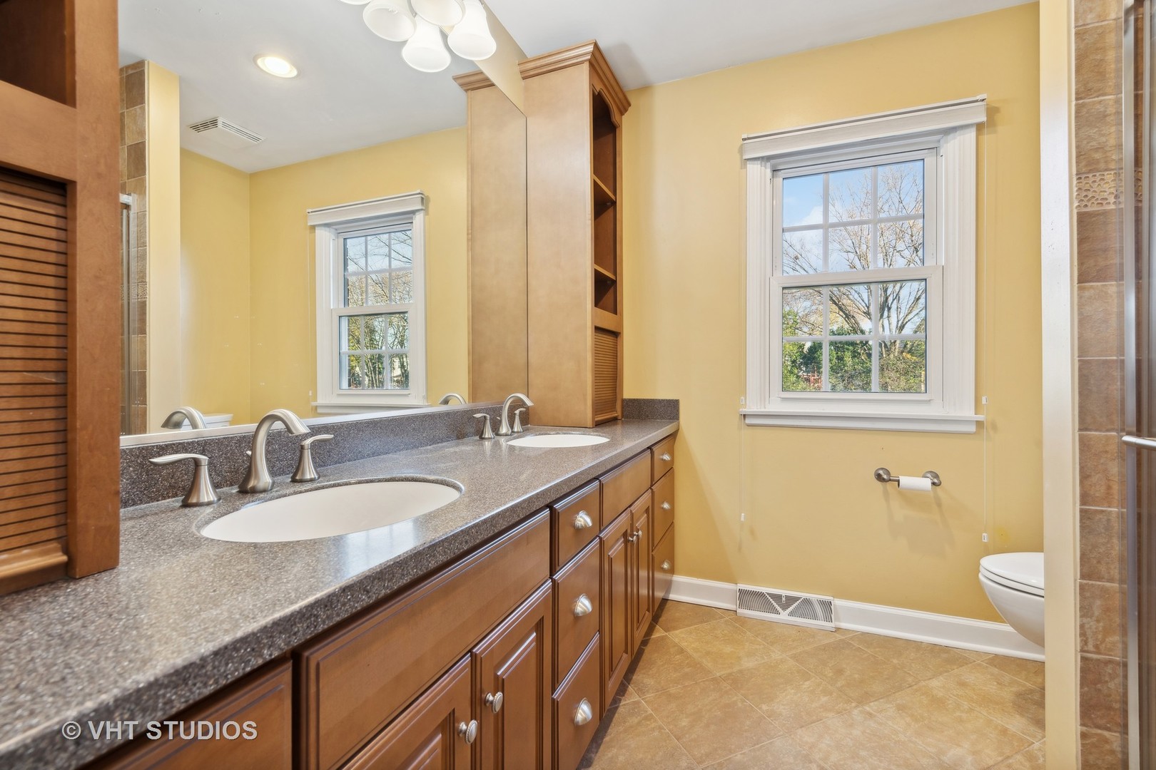 255 Cold Spring Road Barrington, IL 60010 - Photo 29 of 47 a bathroom with a granite countertop sink toilet and shower