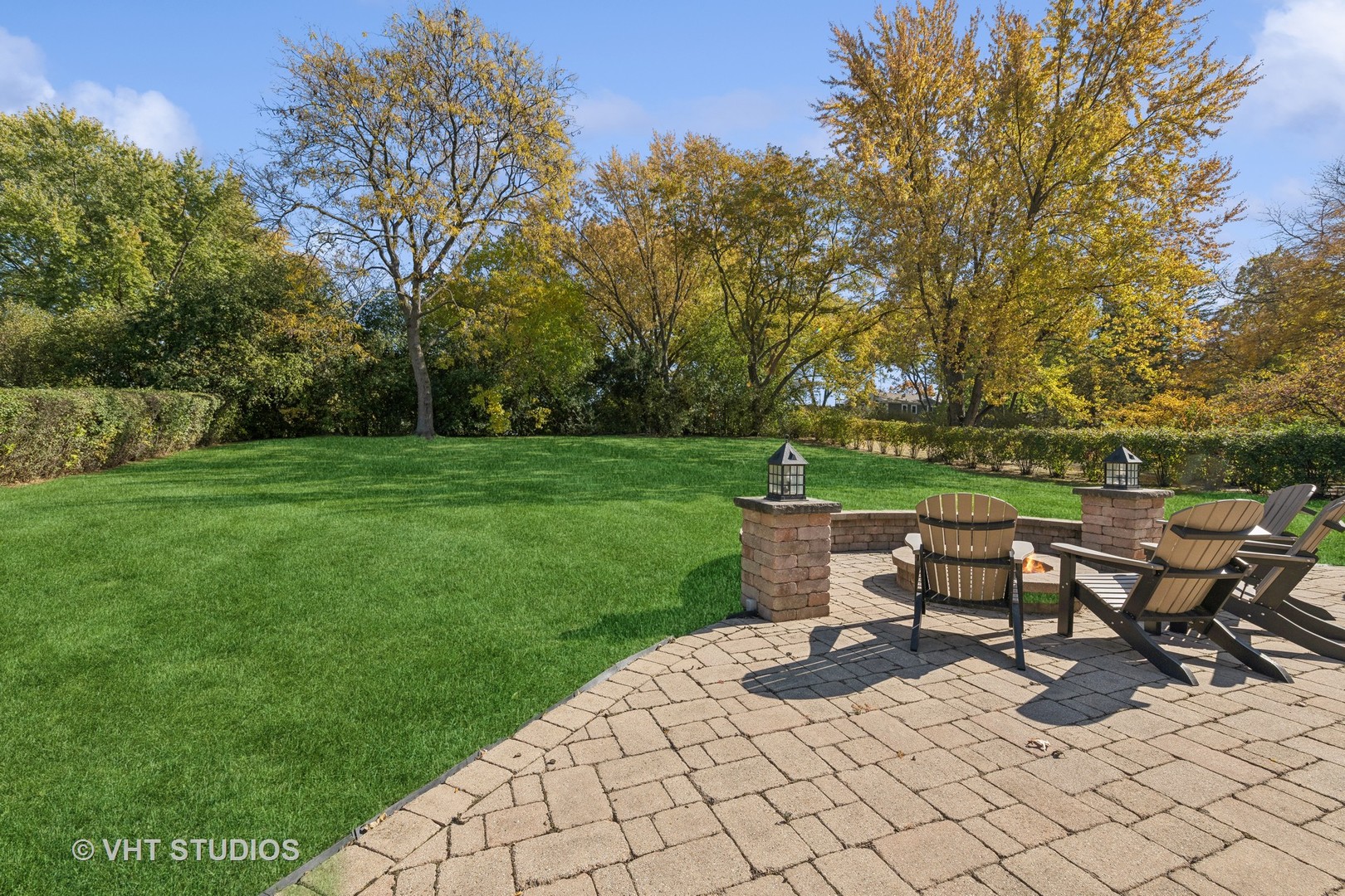 255 Cold Spring Road Barrington, IL 60010 - Photo 41 of 47 a view of a bench in the garden near a lake