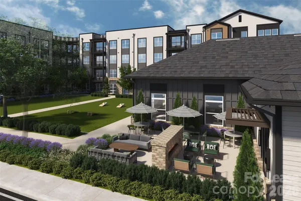 a front view of a house with garden and porch