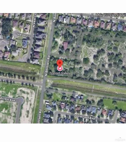 a picture of a room with a white wall and a picture