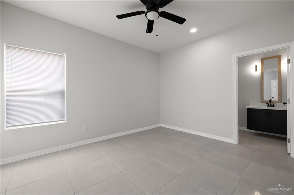 4204 Hummingbird Avenue McAllen, TX 78504 - Photo 12 of 13 a view of an empty room with a window