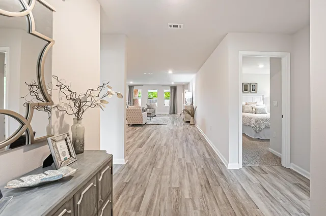 a very nice looking room with wooden floor