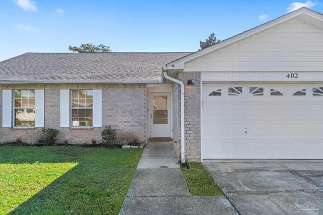 a front view of house with yard