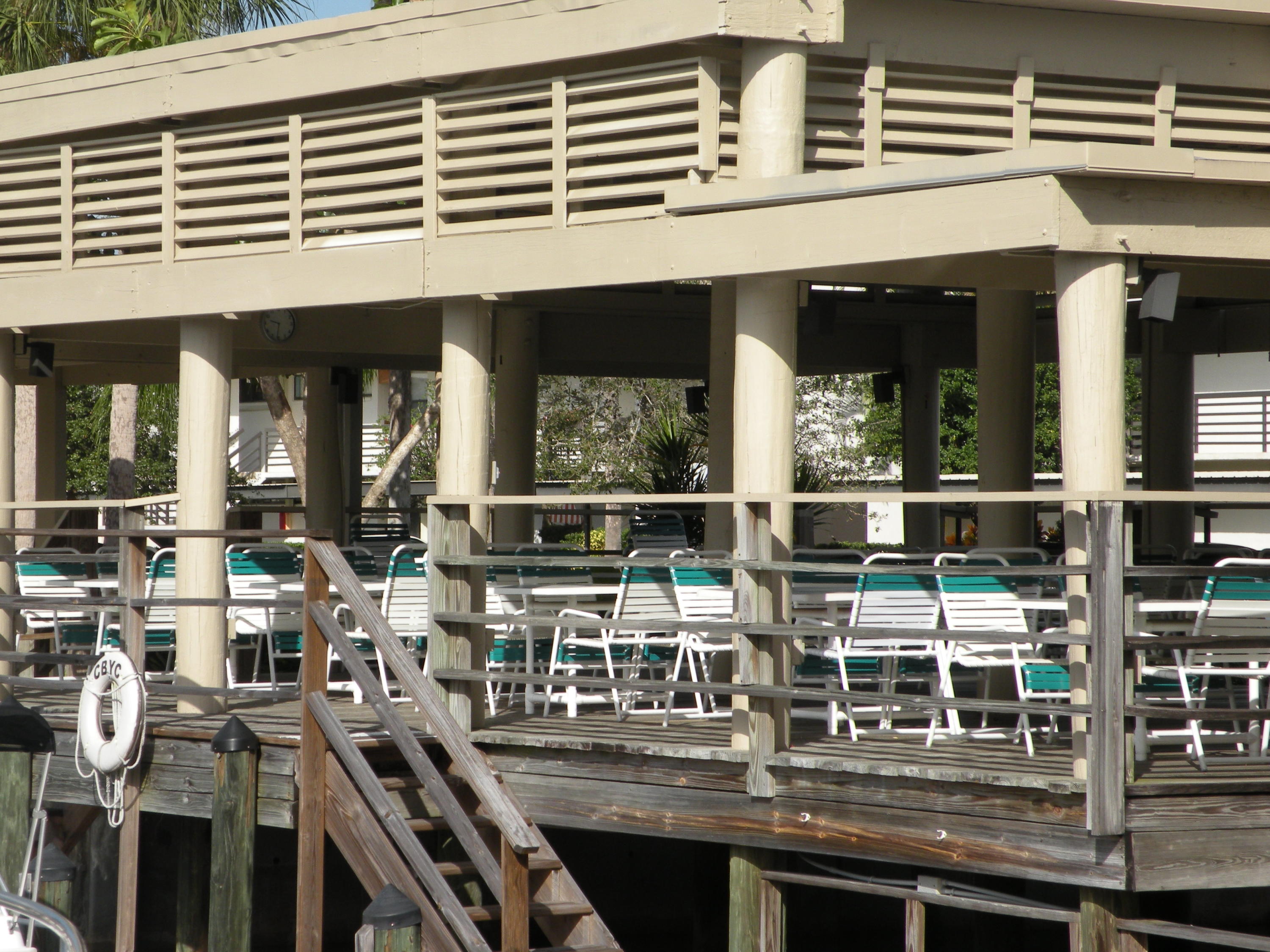 1950 Southwest Palm City Road, Unit 6308 Stuart, FL 34994 - Photo 17 of 18 DECK DINING OVER WATER