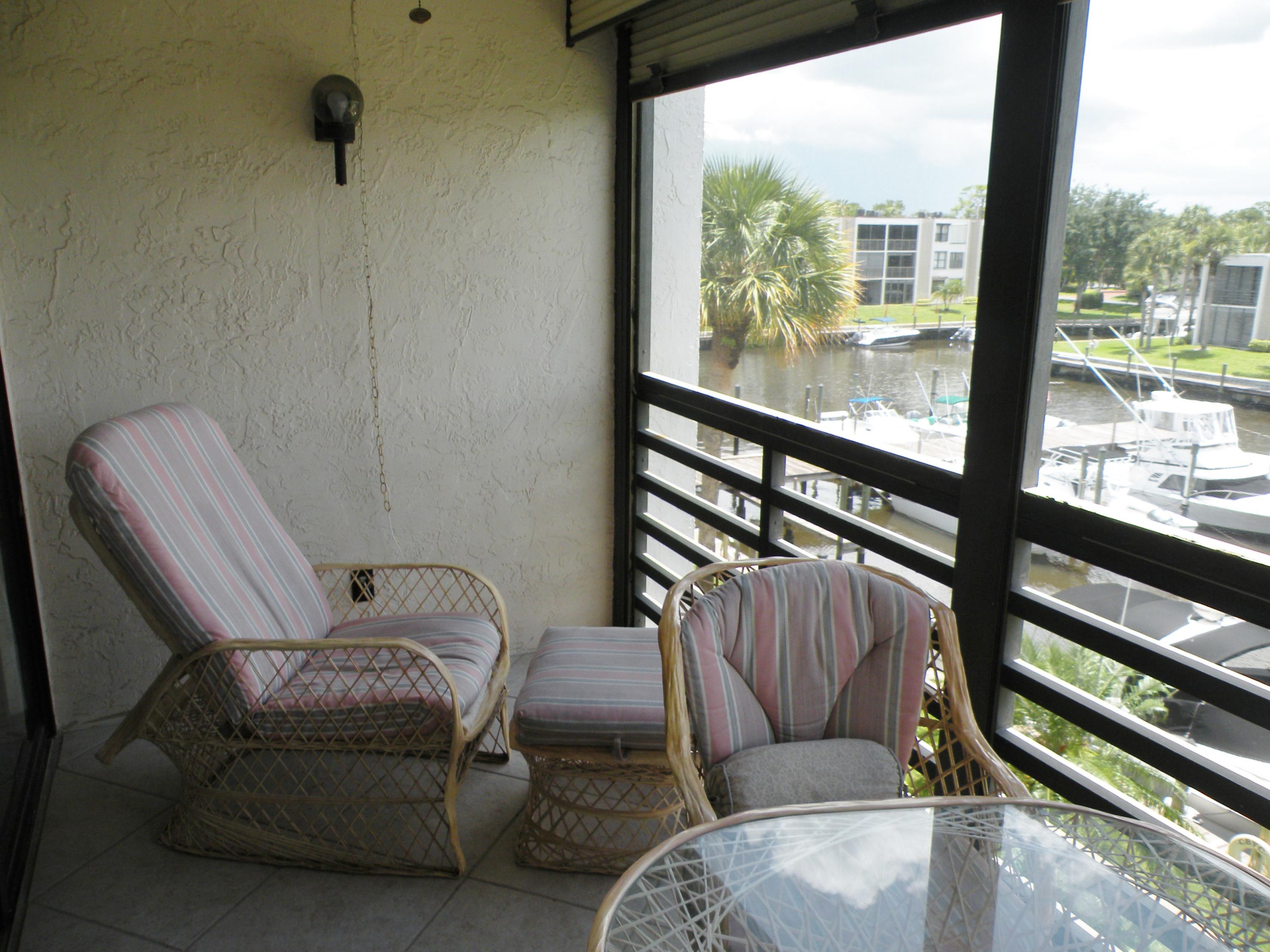 1950 Southwest Palm City Road, Unit 6308 Stuart, FL 34994 - Photo 8 of 18 PORCH W/ VIEW