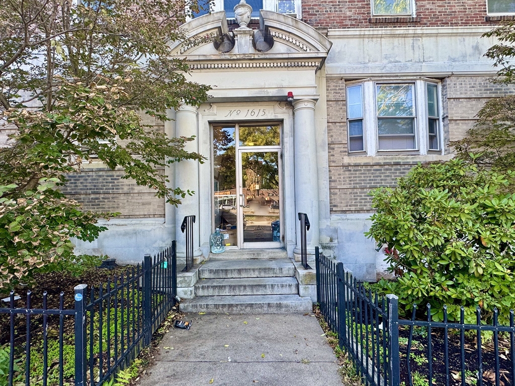 1615 Commonwealth Avenue, Unit 6 Boston, MA 02135 - Photo 10 of 11 a front view of a house with a porch