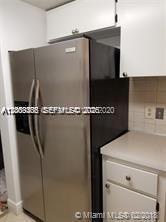 6943 Southwest 40th Street, Unit 11R Miramar, FL 33023 - Photo 7 of 11 a close view of closet