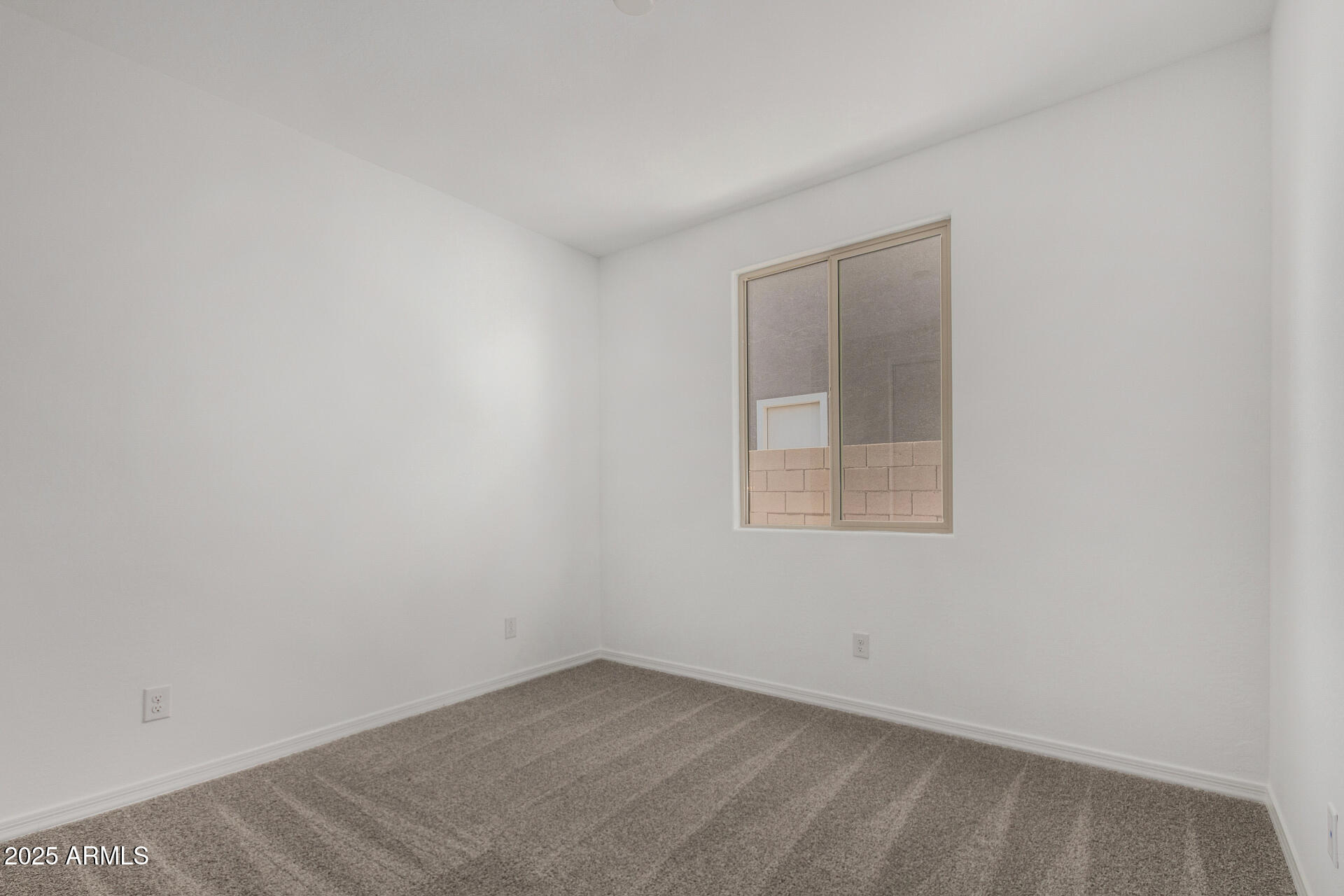 18474 East Dario Road Gold Canyon, AZ 85118 - Photo 18 of 36 an empty room with a window