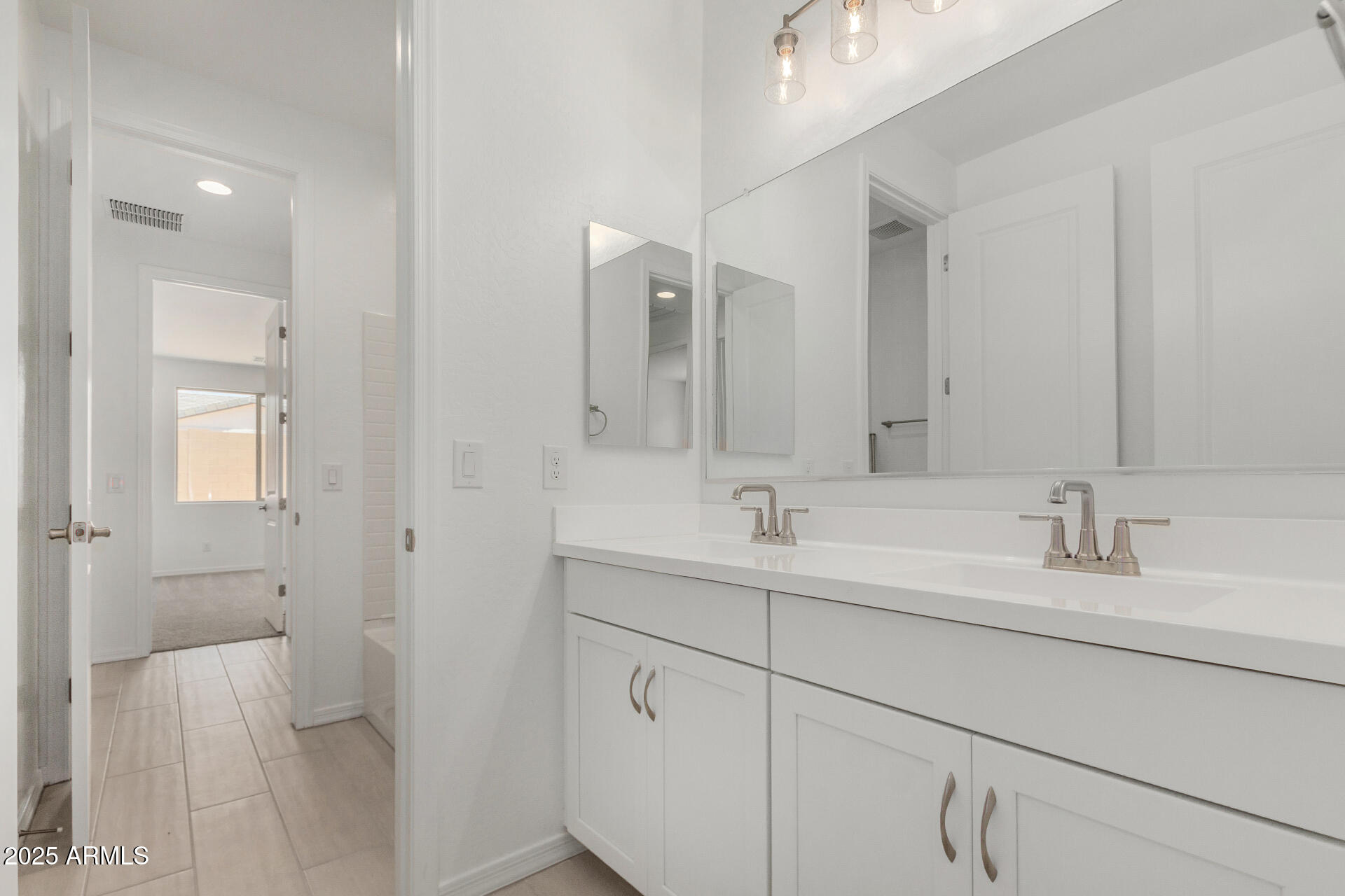 18474 East Dario Road Gold Canyon, AZ 85118 - Photo 22 of 36 a bathroom with a sink and a mirror