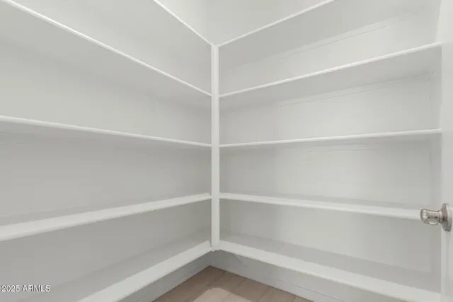 a view of an empty walk in closet