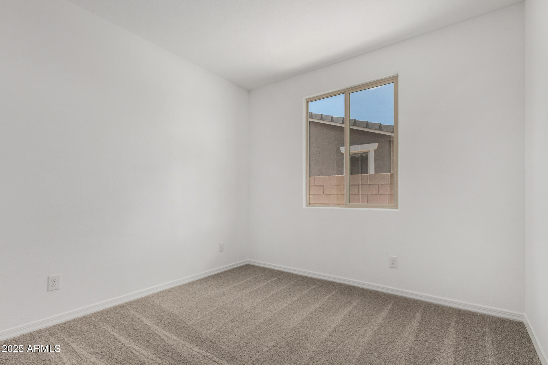 18474 East Dario Road Gold Canyon, AZ 85118 - Photo 9 of 36 a view of an empty room with a window