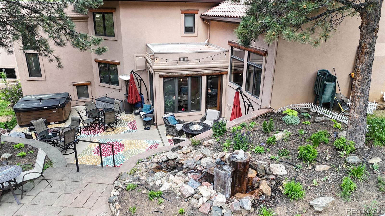 974 Spring Ranch Drive Golden, CO 80401 - Photo 45 of 50 a view of the dinning table and chairs in patio