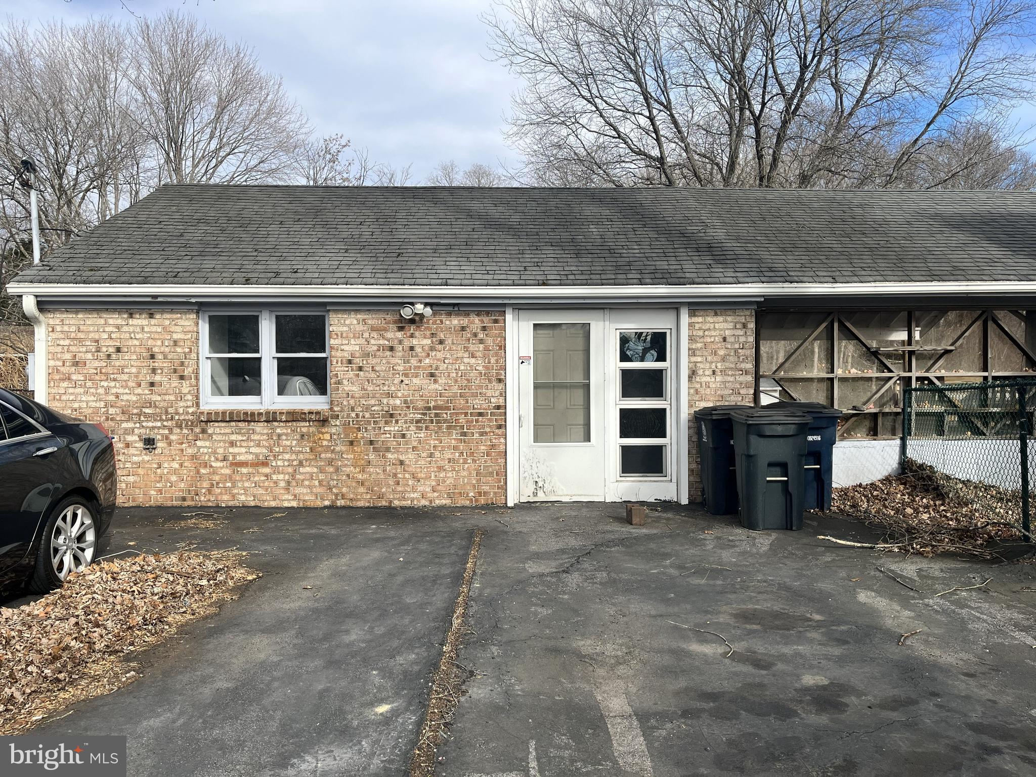 a front view of a house with barbeque area