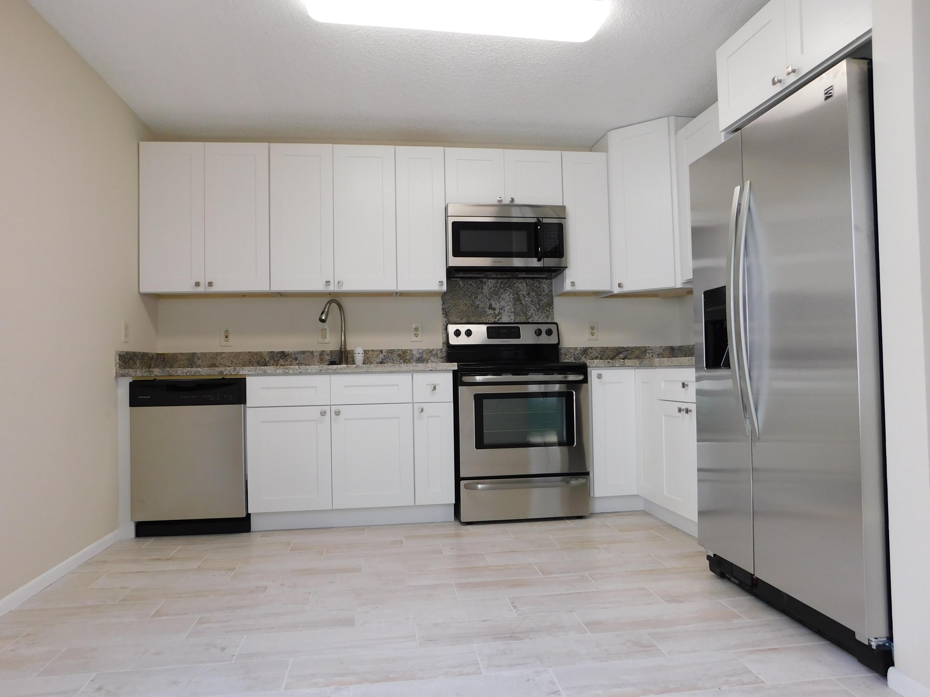 9175 Southwest 20th Street, Unit A Boca Raton, FL 33428 - Photo 5 of 23 KITCHEN