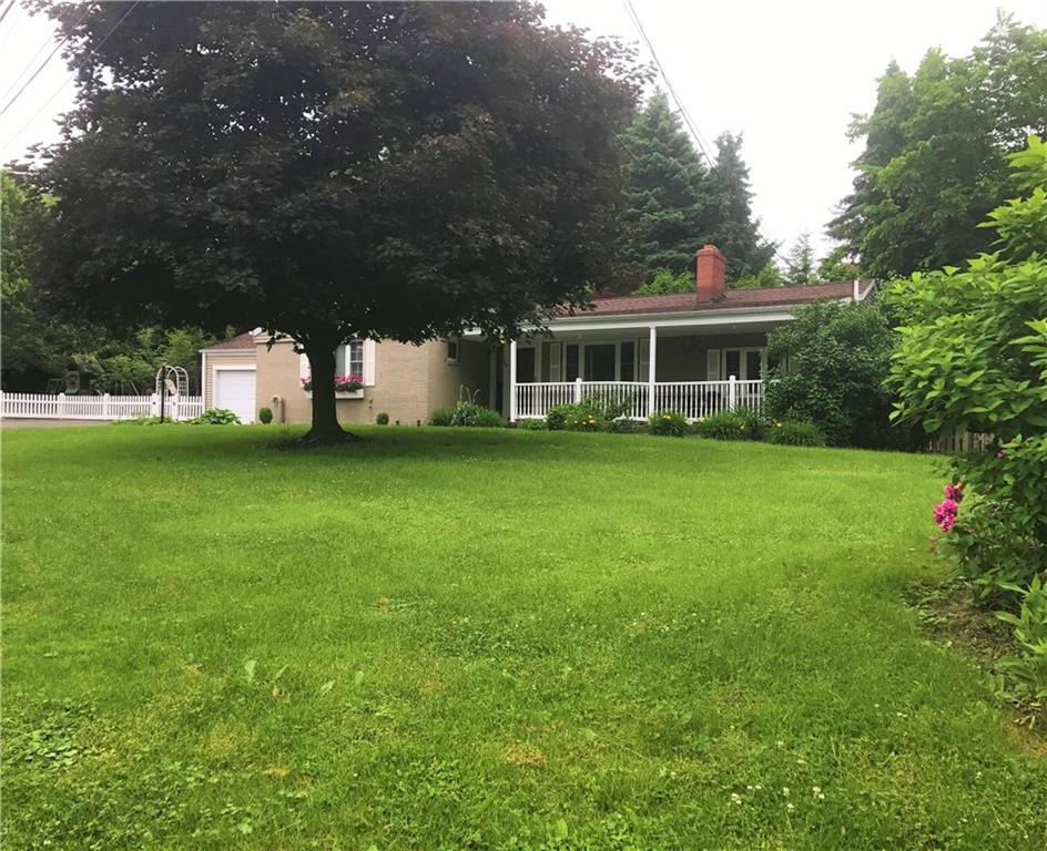 The spacious front yard sets the home off of Shafer Road.  The oversized driveway will accommodate plenty of guests for entertaining. 