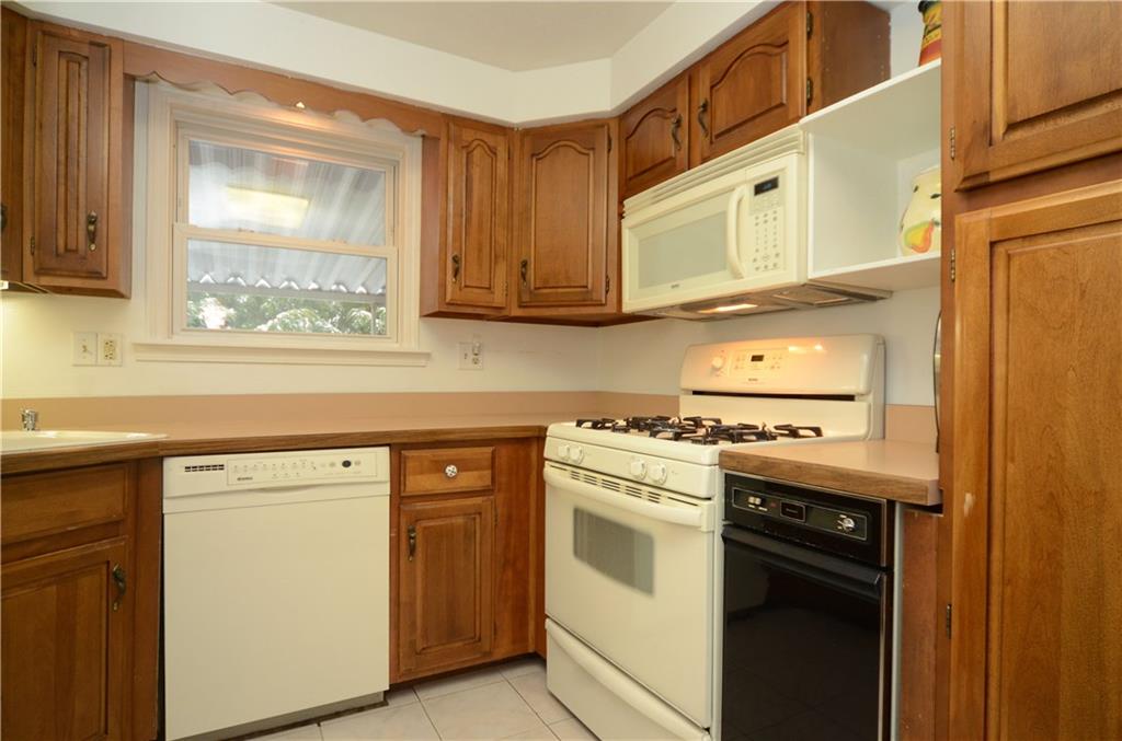 146 Shafer Road Coraopolis, PA 15108 - Photo 11 of 25 Refrigerator, stove, dishwasher, overhead microwave, and trash compactor included.