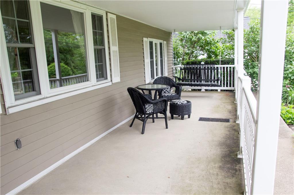You will enjoy resting on the front porch enjoying the many perennial flowers planted around the entire property. 