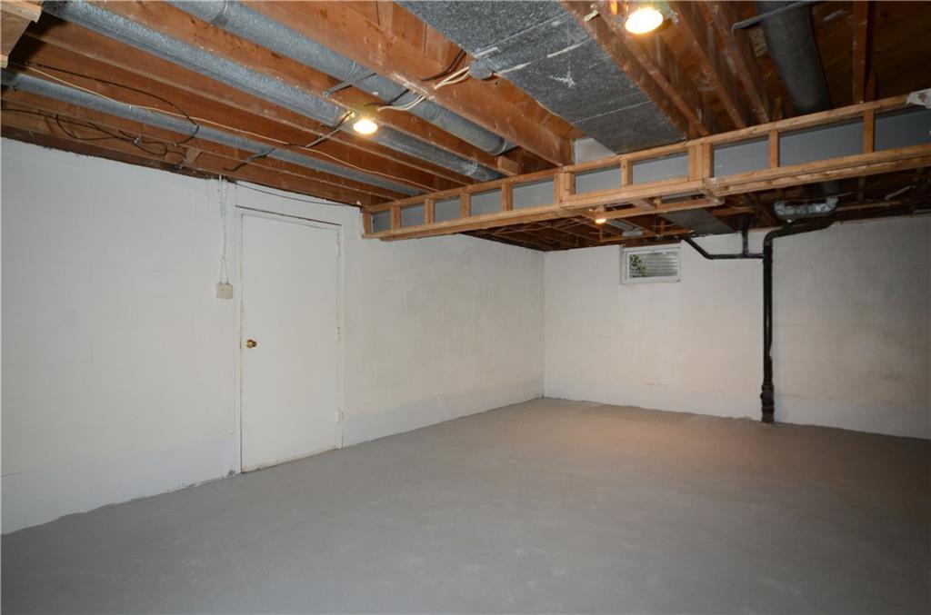 146 Shafer Road Coraopolis, PA 15108 - Photo 21 of 25 Clean slate for a lower level to finish as you would like. Plenty of storage, internal french drain, laundry area, and full bath.