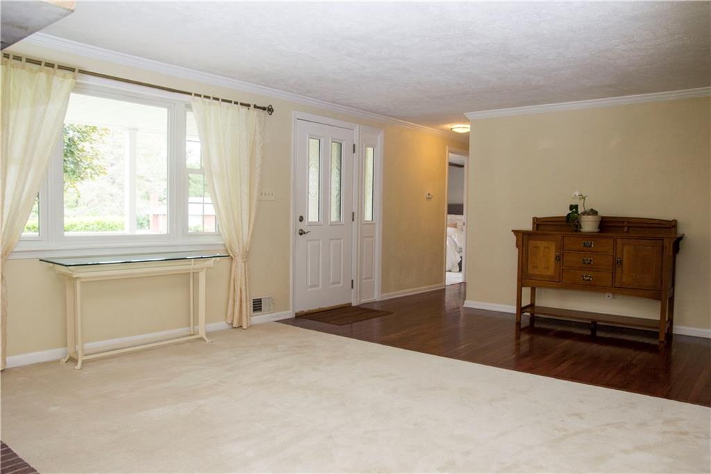 Front entrance leading in to the living room.