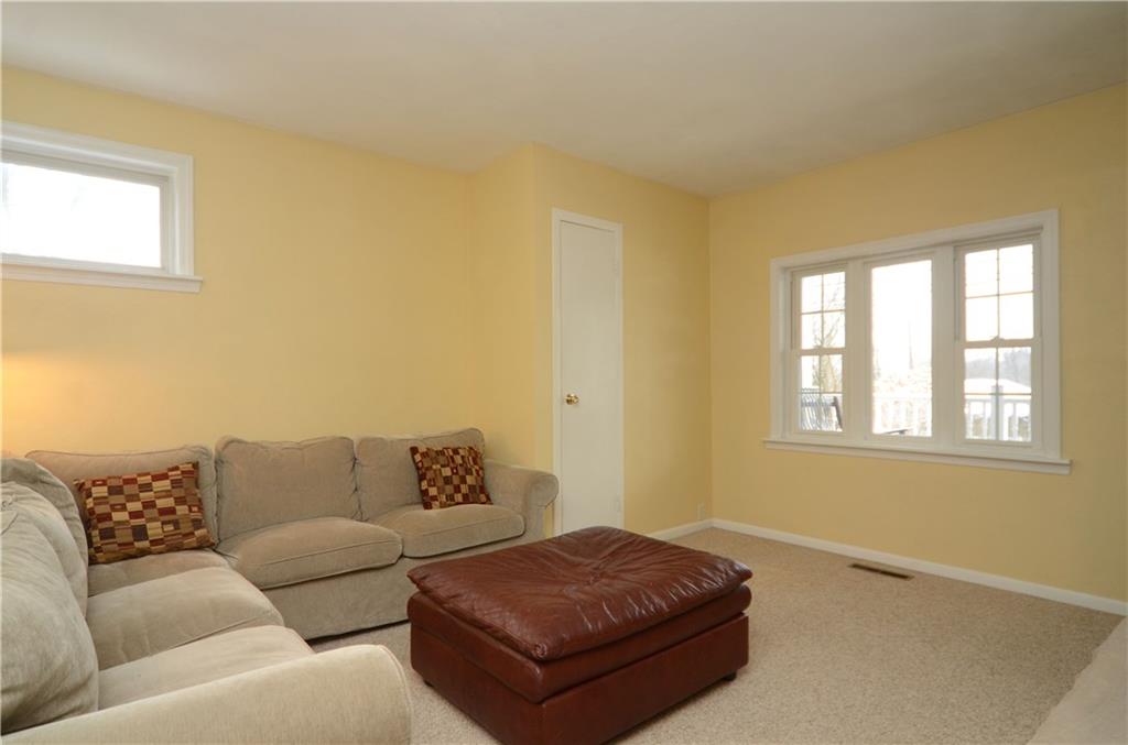 Comfortable family room with plenty of natural light.