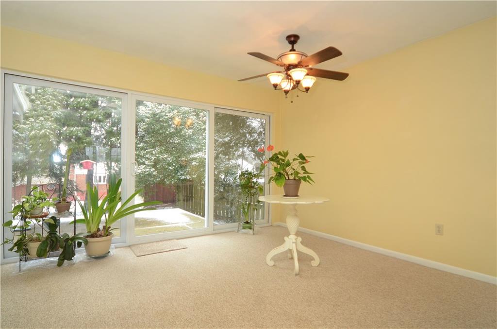 146 Shafer Road Coraopolis, PA 15108 - Photo 8 of 25 Dining room area featuring plate glass windows overlooking the back porch and yard. A slider also gives you quick access to the back porch.