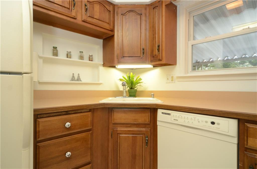 146 Shafer Road Coraopolis, PA 15108 - Photo 10 of 25 This efficient kitchen features solid wood cabinets.