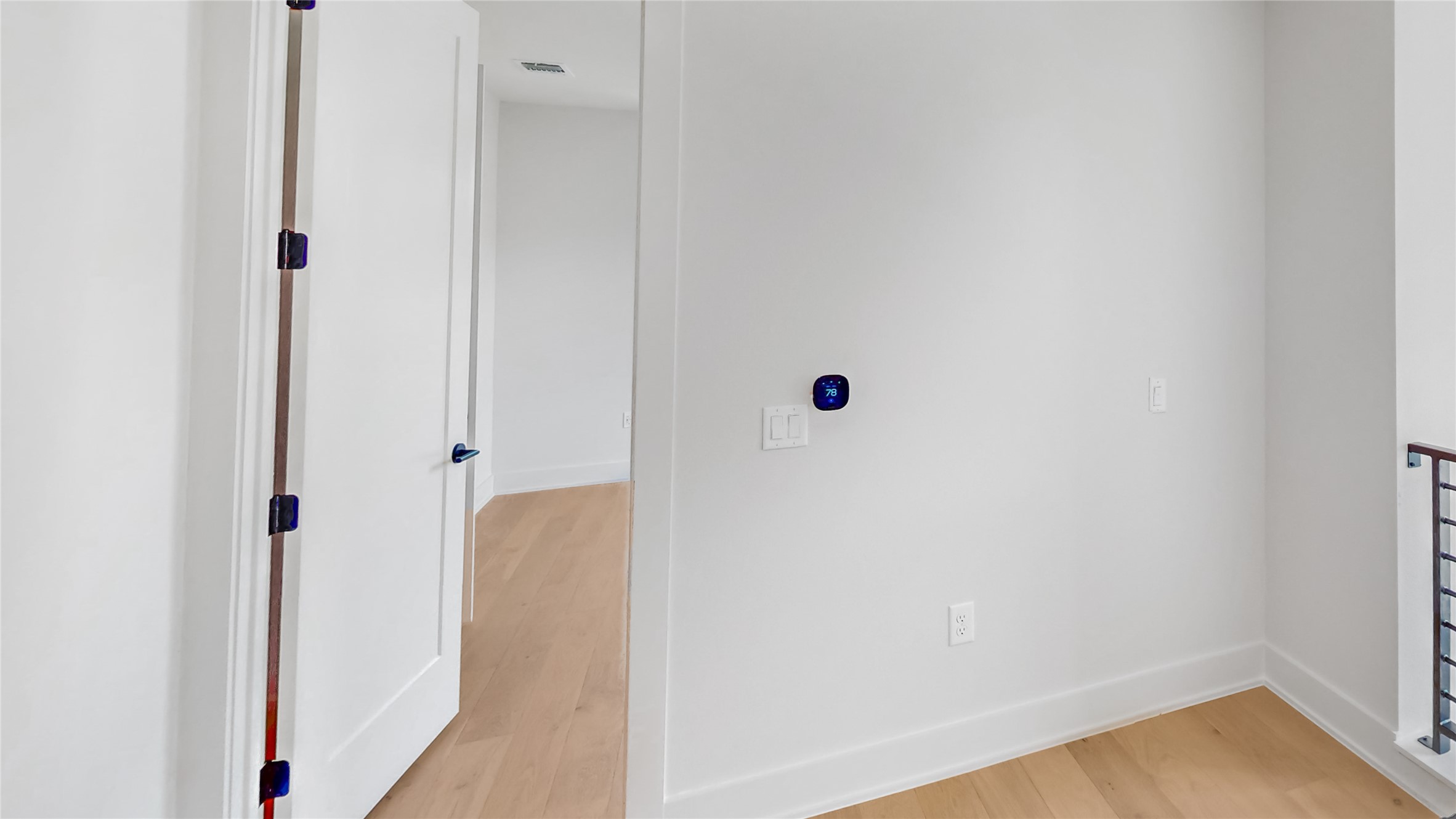 4424 Hank Avenue, Unit 2 Austin, TX 78745 - Photo 9 of 11 Clean lines and light wood flooring define this adaptable interior space.