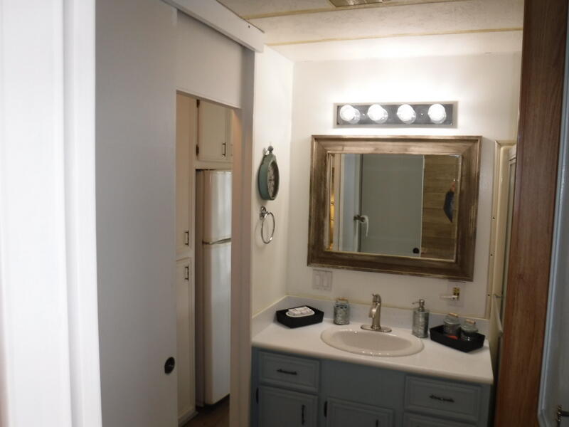 Undisclosed Address Indio, CA 92203 - Photo 22 of 33 a bathroom with a sink and a mirror