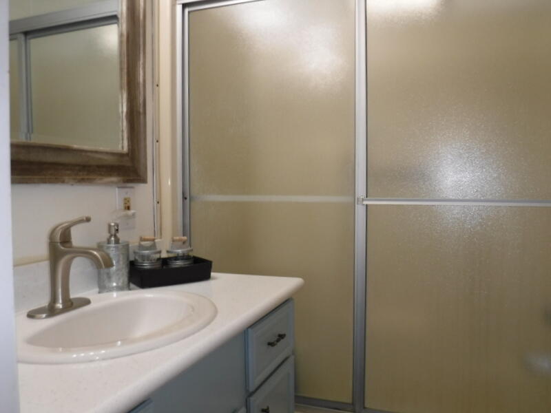 Undisclosed Address Indio, CA 92203 - Photo 23 of 33 a bathroom with a sink and a mirror