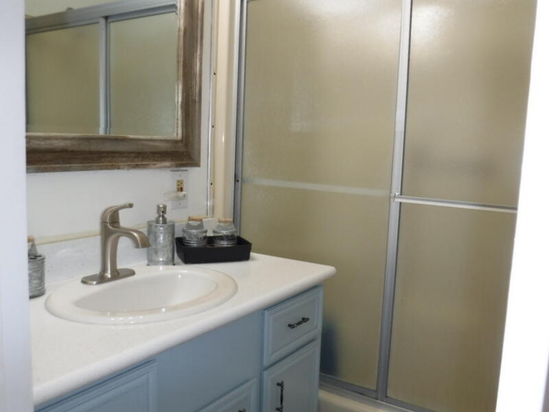 Undisclosed Address Indio, CA 92203 - Photo 24 of 33 a bathroom with a sink and a mirror