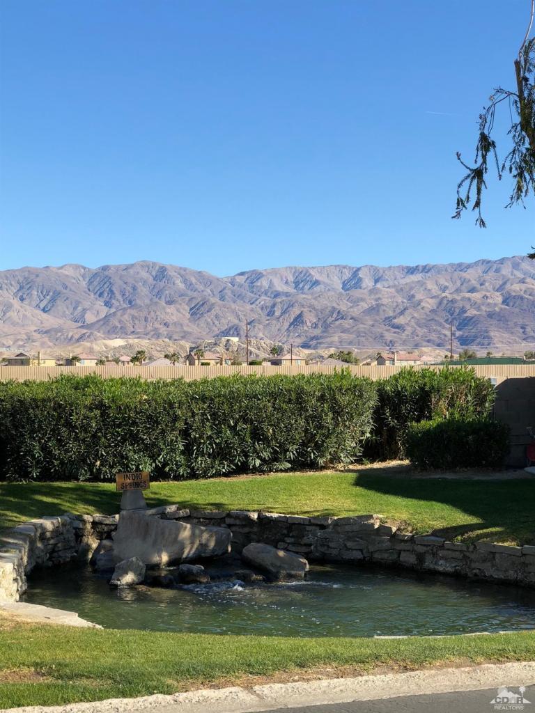 Undisclosed Address Indio, CA 92203 - Photo 26 of 33 an aerial view of a house with a garden