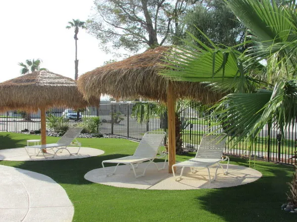 a view of a park with a slide and table