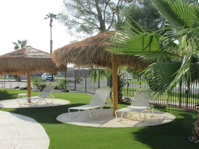 a view of a park with a slide and table