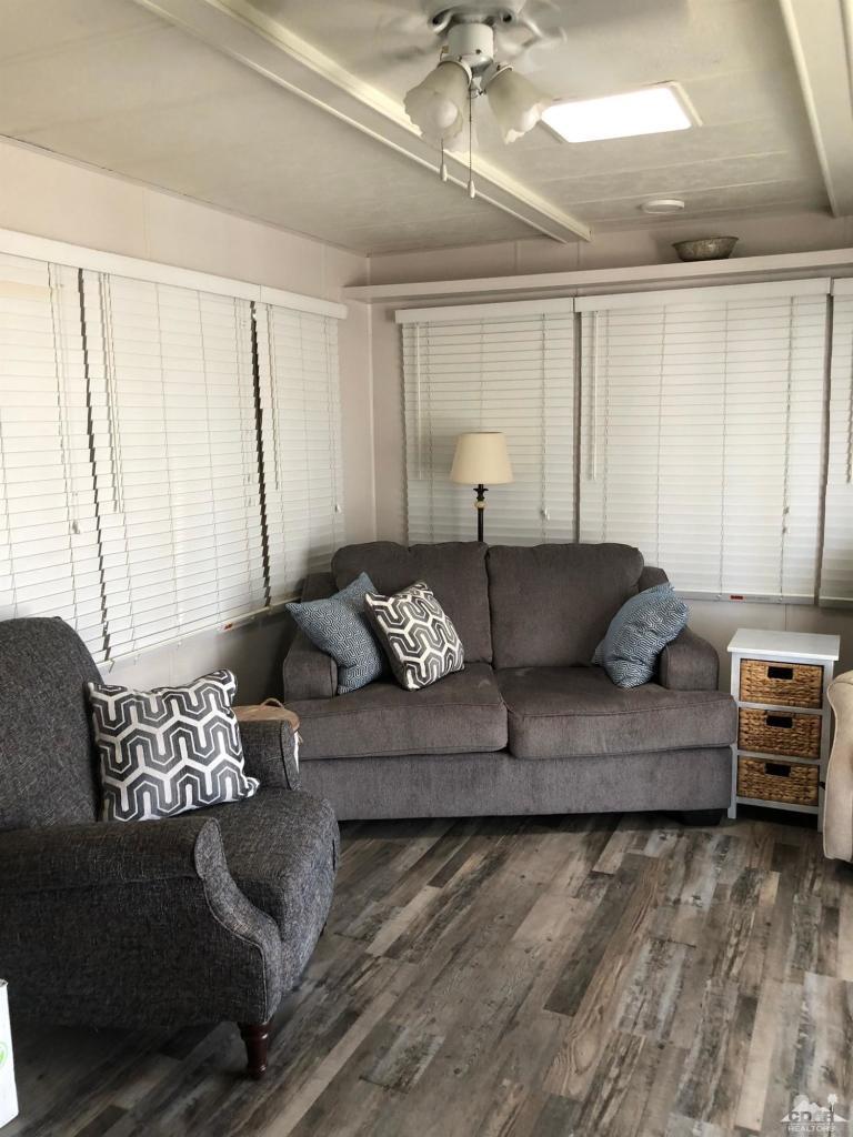 Undisclosed Address Indio, CA 92203 - Photo 6 of 33 a living room with furniture and a large window