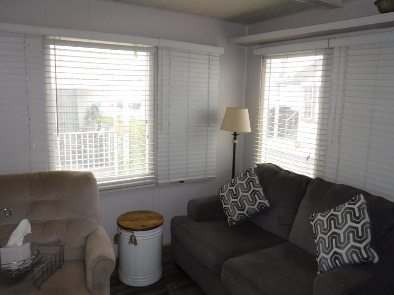 Undisclosed Address Indio, CA 92203 - Photo 7 of 33 a living room with furniture and a large window