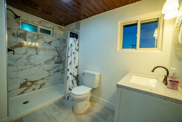 a view of an empty room with a projector