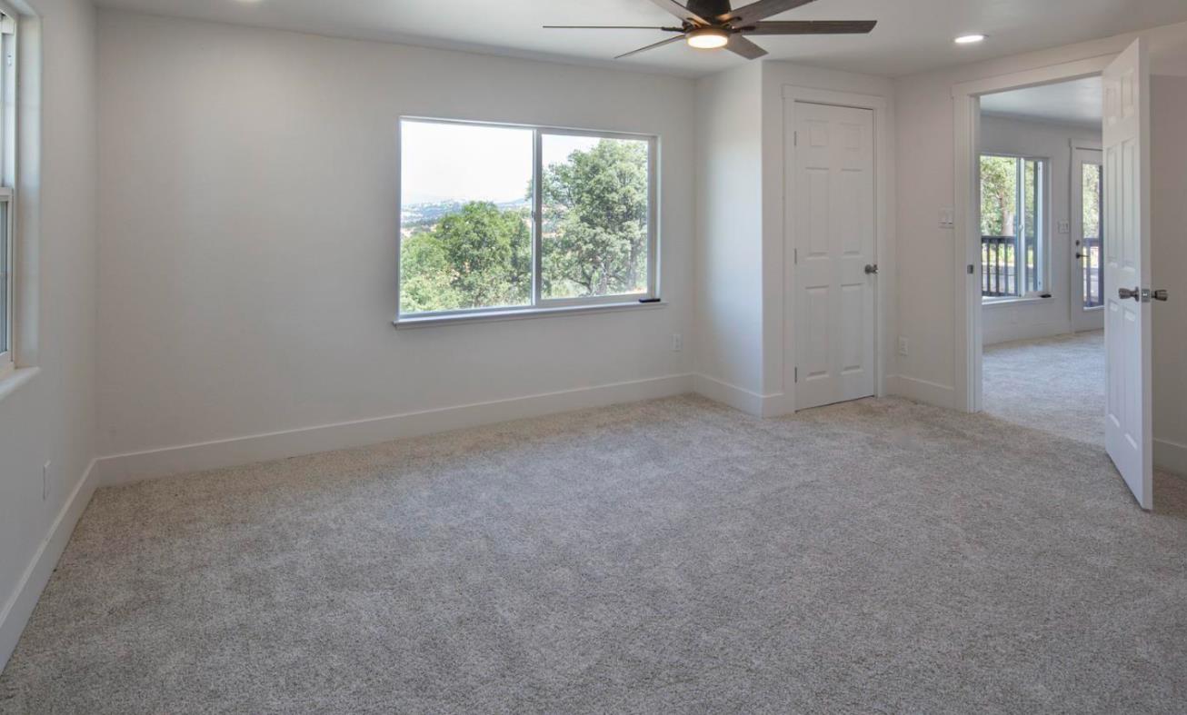 14594 Perricone Road Jamestown, CA 95327 - Photo 21 of 48 wooden floor in an empty room with a window