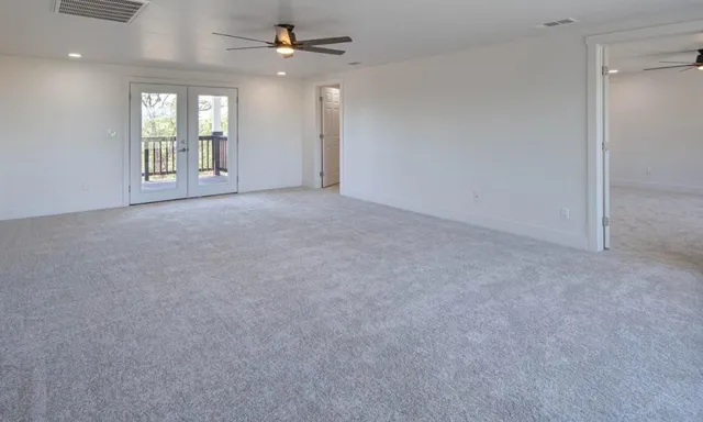 a view of a balcony with wooden floor